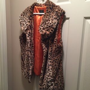 Plush cheetah pattern vest.